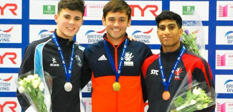 Tom Daley scores top marks at British National Diving Cup in front of new baby Robbie, husband Lance and sell-out Plymouth crowd