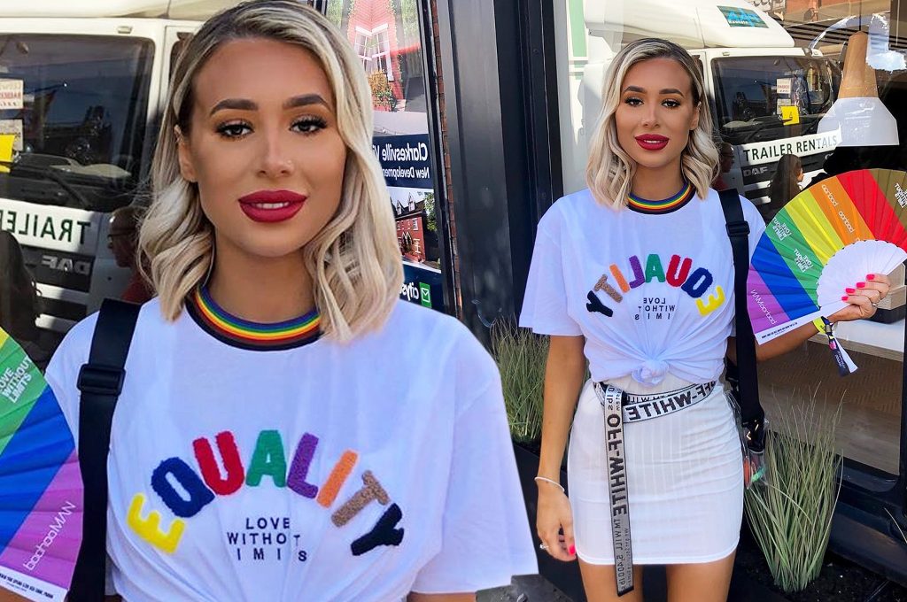 Demi Sims commands attention as she cuts slim figure in rainbow t-shirt while attending gay pride festival in Manchester