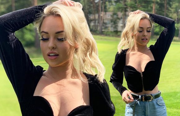Jorgie Porter shows off her ample assets in revealing black top as she soaks up the sun while on trip to theatre in Bournemouth