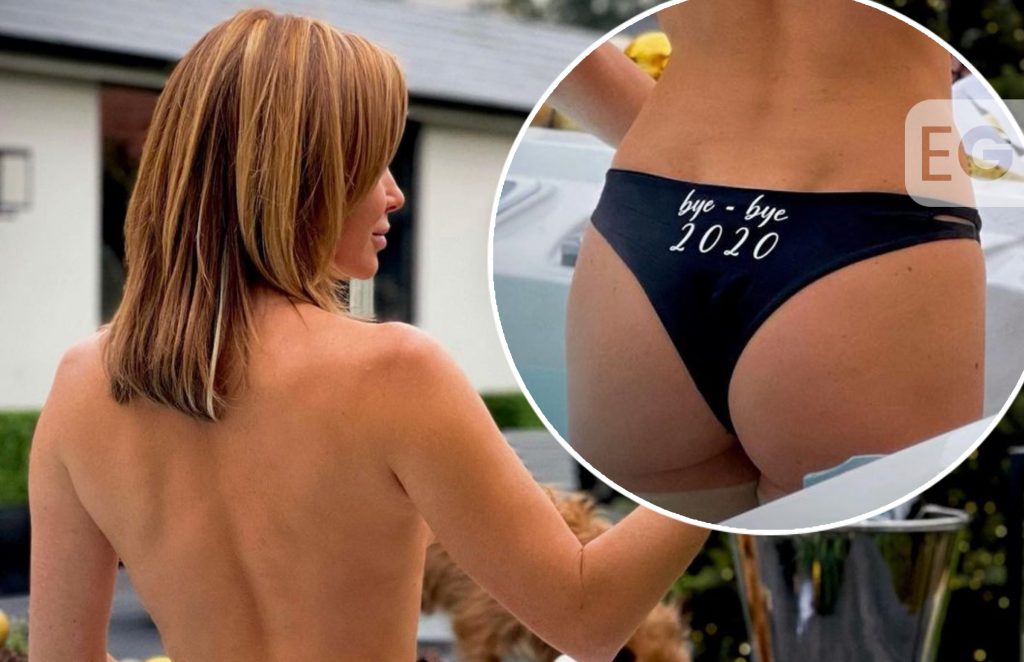 Amanda Holden welcomes the New Year topless in hot tub