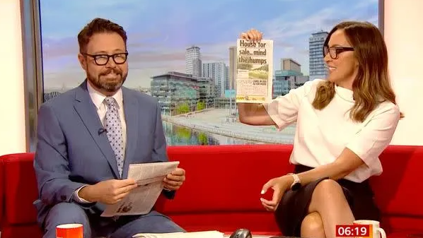 At this point Jon had realised what was on the back of the paper. Picture: BBC