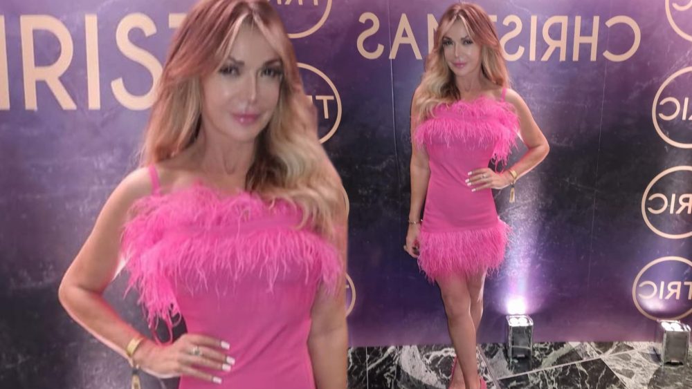 Lizzie Cundy shows off her legs as she 'dresses as a flamingo' at TRIC Awards