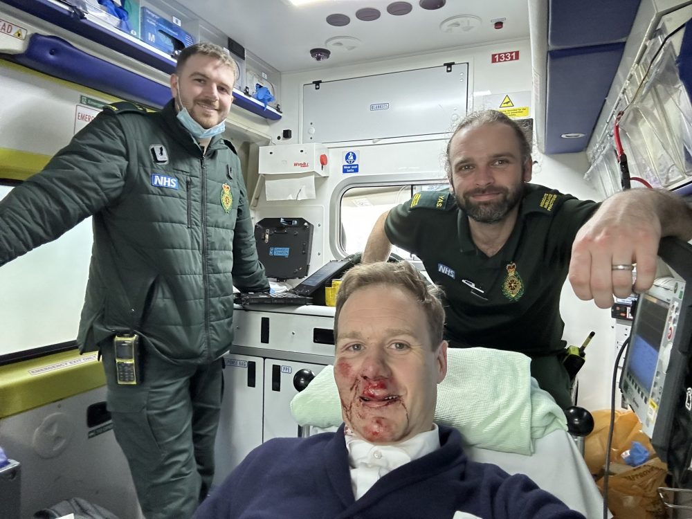 Dan shared a bloodied photo from the back of an ambulance. Picture: TWITTER